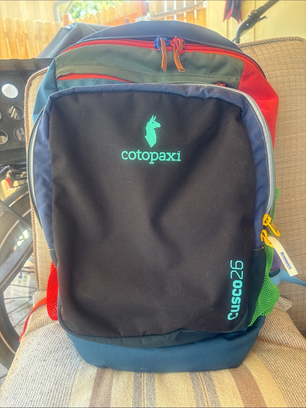 cotopaxi Multicolor Cusco 26 Backpack — Black Front, Blue Base, Red Accent